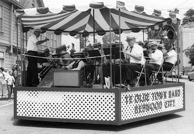 The Band performs on the gazebo-shaped float in 1970